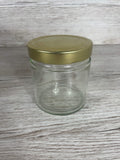Frontalansicht des leeren 415 ml Deep Rundglases mit geschlossenem goldenem Deep-Deckel – ideal zum Etikettieren