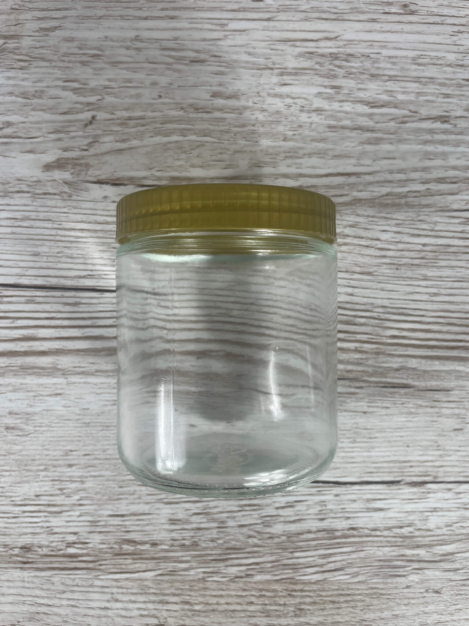 Geschlossenes 500g Neutralglas mit glatter Oberfläche und goldenem Schraubverschluss